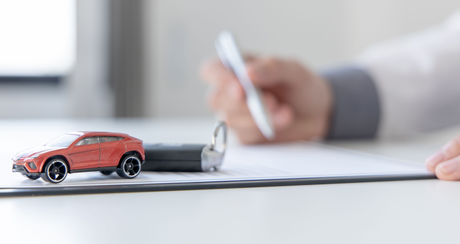 Car dealers or insurance managers cover and protect against damage